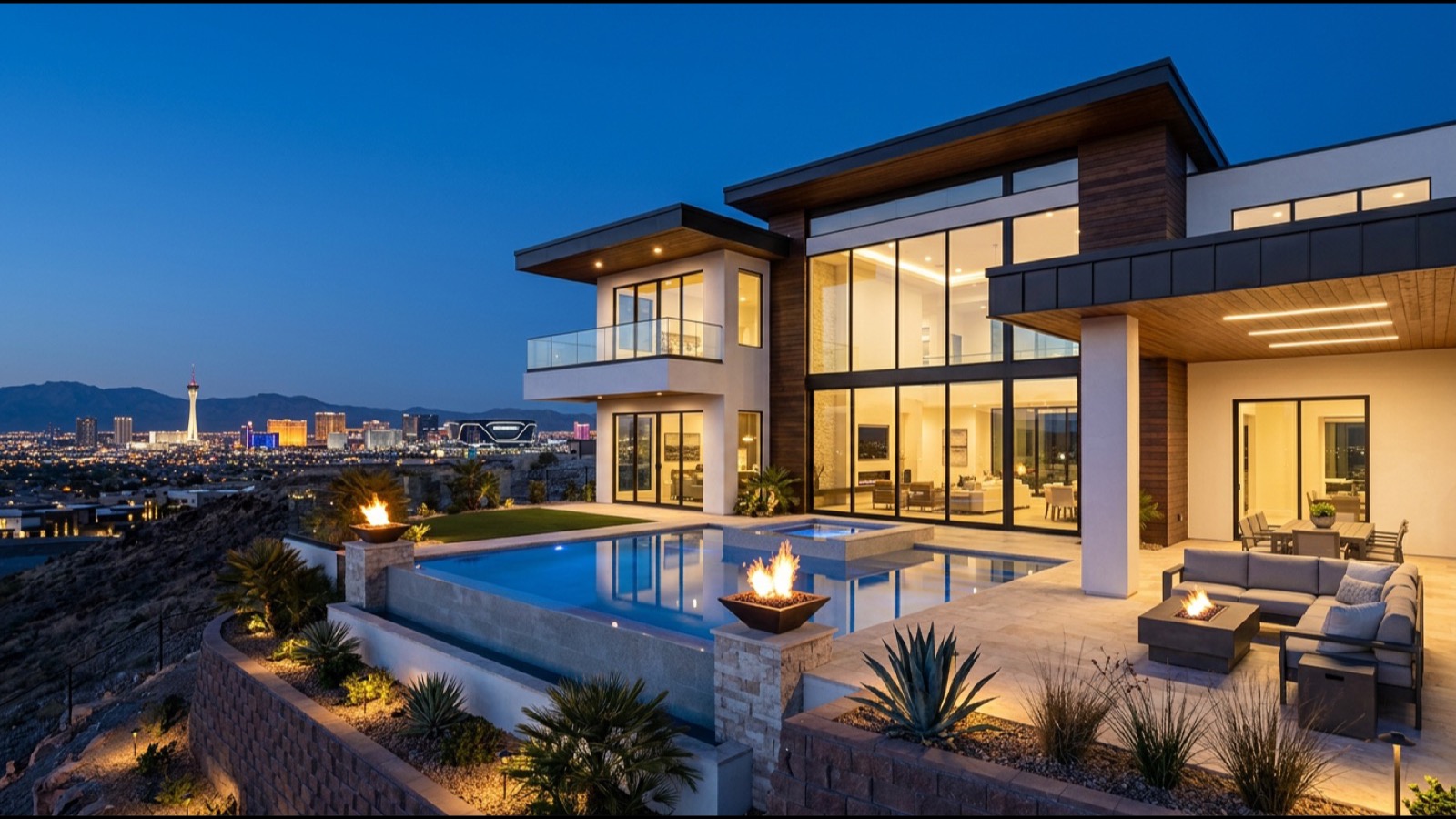 The Paseos Summerlin million dollar Mediterranean home with mature landscape barrel-tile roof stucco façade and three-car garage facing a quiet established village streetscape