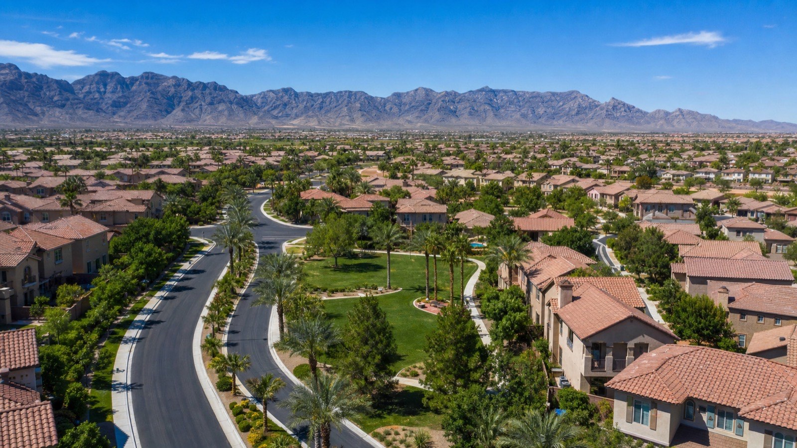 Sunrise Manor east Las Vegas family residential streetscape with established single-family homes and Sunrise Mountain visible in the background